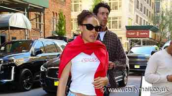 Pregnant Adwoa Aboah shows off her growing baby bump in a white crop top as she steps out with boyfriend Daniel Wheatley in NYC