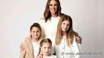 Candice Warner looks every inch the proud mum as she poses with daughters Ivy, Indi and Isla during Mother's Day event