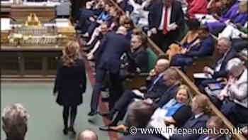 Moment Tory MP Natalie Elphicke walks across Commons floor to join Labour minutes before PMQs
