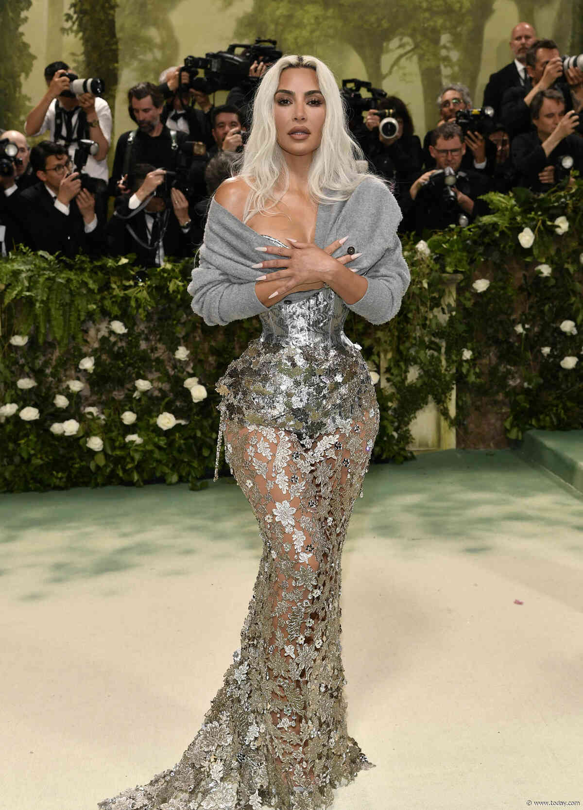 Fans are divided over Kim Kardashian’s Met Gala sweater. She explains why she wore it