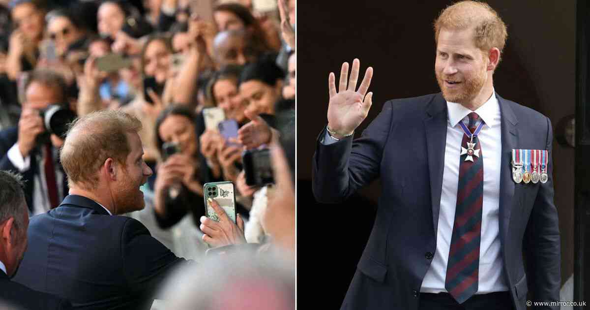 Prince Harry on lively walkabout as public chants 'we love you' after lonely Invictus Games service