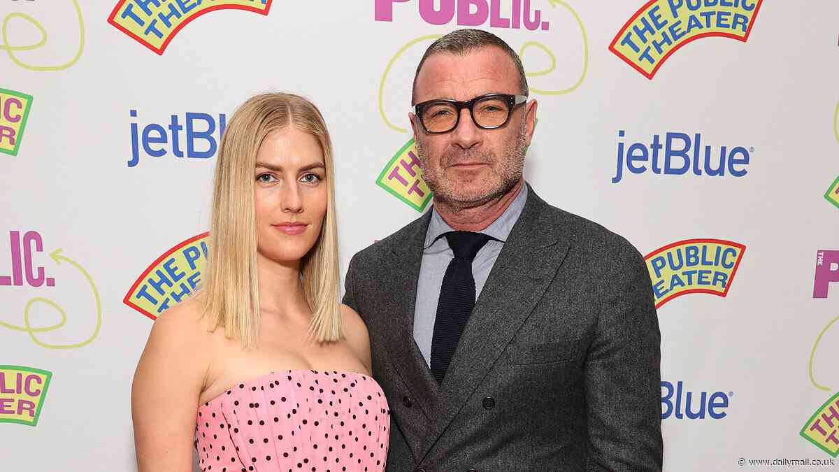 Liev Schreiber, 56, wraps an arm around glamorous wife Taylor Neisen, 32, as they enjoy date night at the 2024 Public Theater Gala
