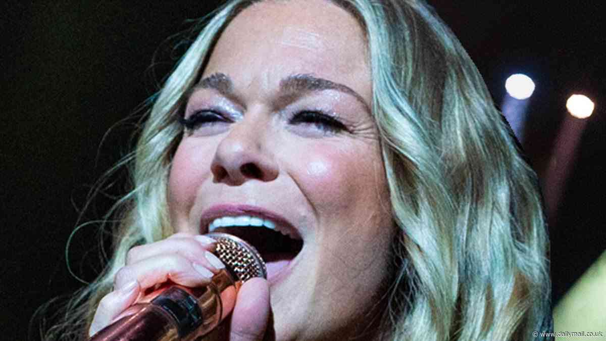 LeAnn Rimes dazzles in a diamante mesh maxi dress and black bodysuit as she performs barefoot at London's O2 Arena - six years since her last UK gig
