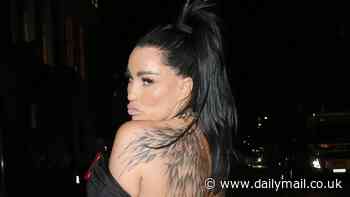 Katie Price, 45, pokes fun at her surgically enhanced bottom in TINY leather mini skirt as she enjoys a date night with boyfriend JJ Slater, 31, at fashion party