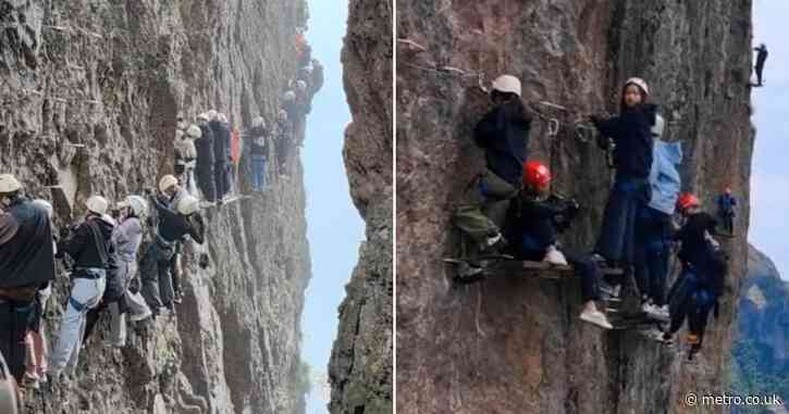 Hundreds desperately left clinging to sheer rock face for two hours