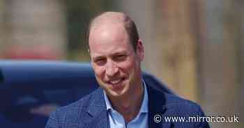 Prince William grins as he is seen for first time since avoiding Prince Harry on UK return