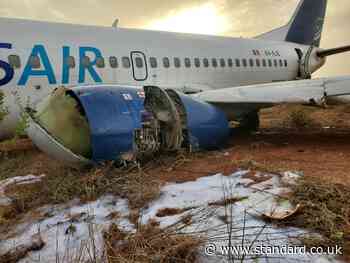 Boeing 737 passenger jet skids off runway and crashes at airport in Senegal