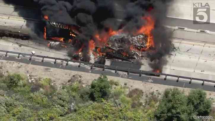 Semi-truck carrying meat incinerated by massive fire on Los Angeles highway