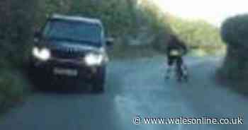 Cyclist narrowly escapes being mown down by out-of-control 4x4