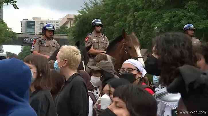 Man arrested after carrying gun during UT protests, court documents say