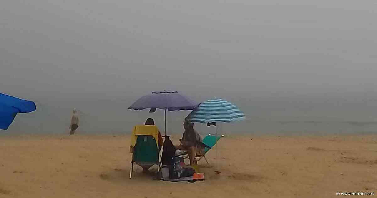 Terrified holidaymakers 'fled' when a Benidorm beach disappeared in a thick fog