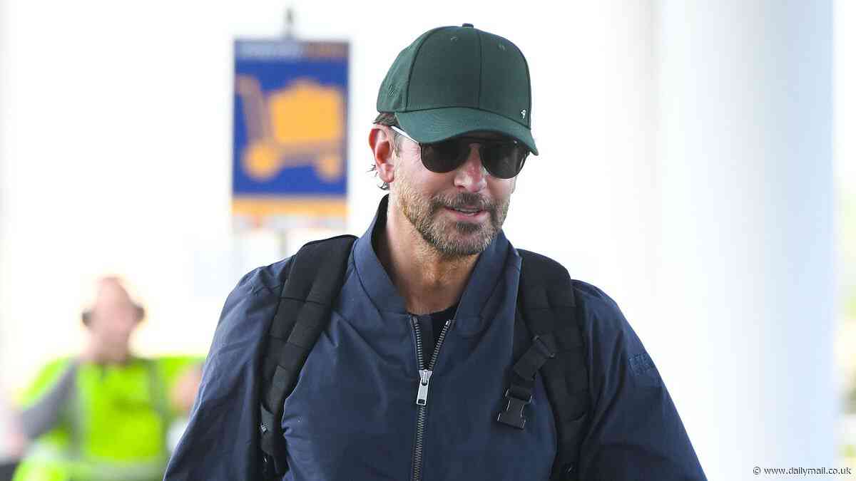 Gigi Hadid, 29, and Bradley Cooper, 49, arrive at JFK Airport in New York at the same time... as romance continues to heat up