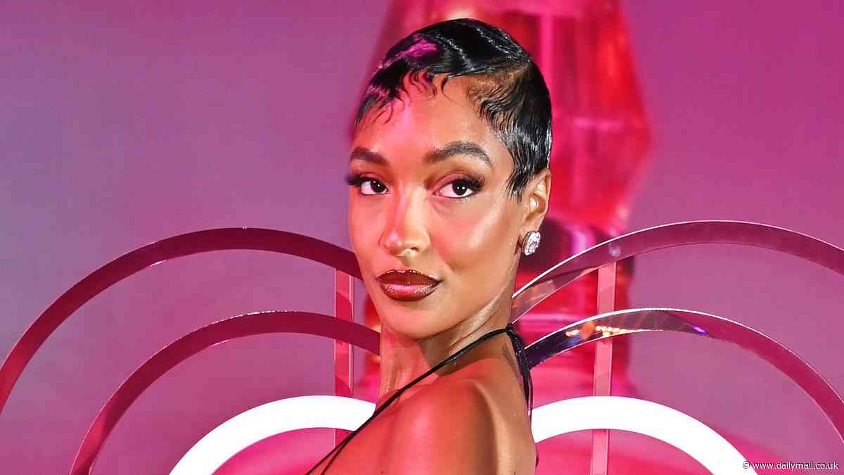 Jourdan Dunn displays her toned figure in a backless gown as she attends Charlotte Tilbury's fragrance launch party in London