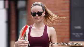 Olivia Wilde bares her washboard abs in burgundy sports bra and leggings while leaving LA gym - as it's revealed she will star in thriller I Want Your Sex