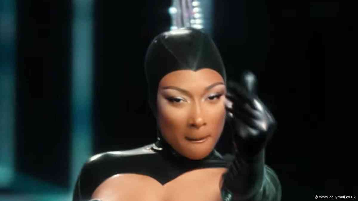 Megan Thee Stallion debuts her raciest music video to date as she channels a sexy video game villain in latest snake-themed track BOA