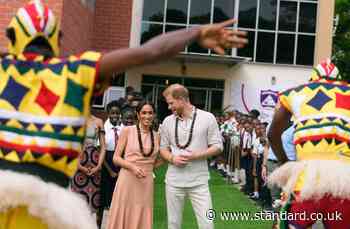 Harry and Meghan visit school as they arrive in Nigeria for three-day visit to promote Invictus Games