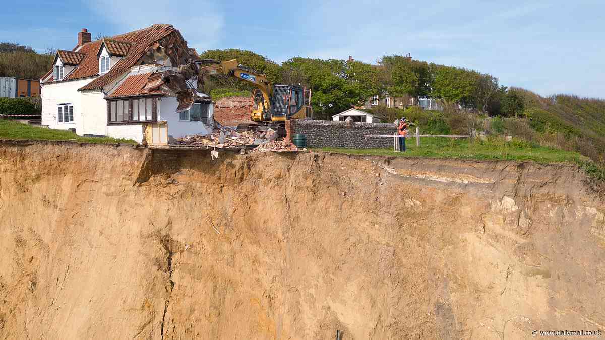 Clifftop farmhouse is demolished in just three hours after owner of £132,000 home teetering on the edge of 150ft drop was forced to evacuate