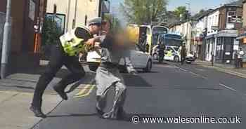 Video shows moment police officer rugby tackles suspect fleeing from back of ambulance