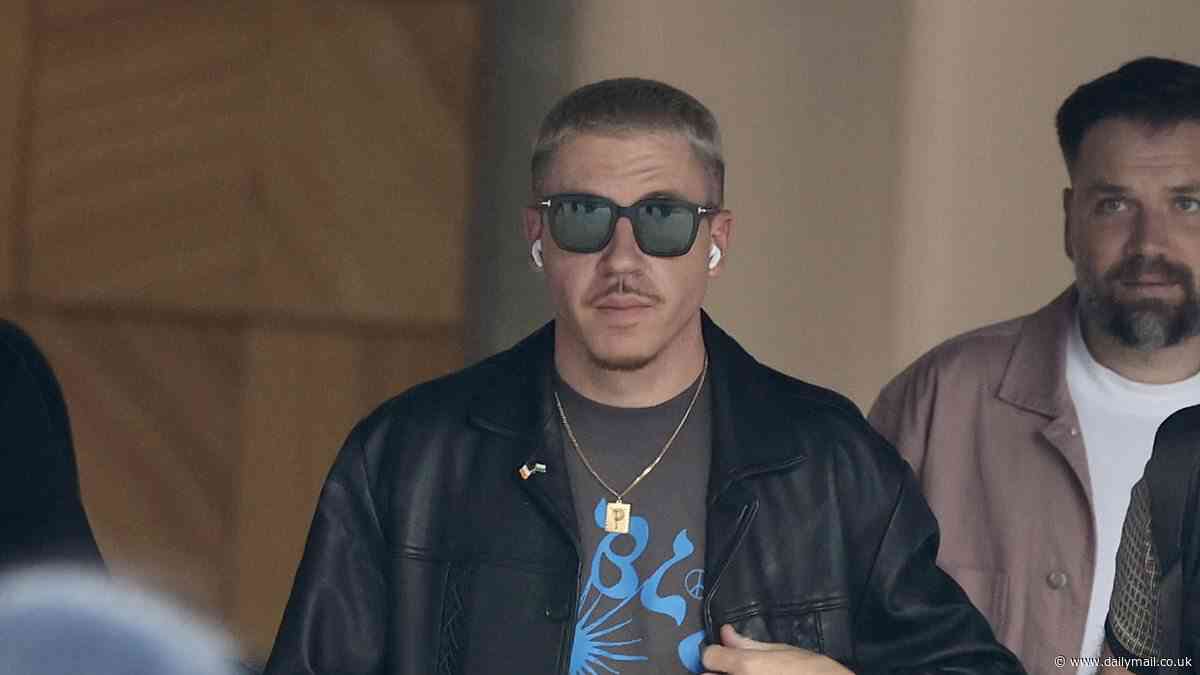 US rapper Macklemore surrounded by fans as he touches down in Australia amidst his Pro-Palestine song Hind's Hall going viral