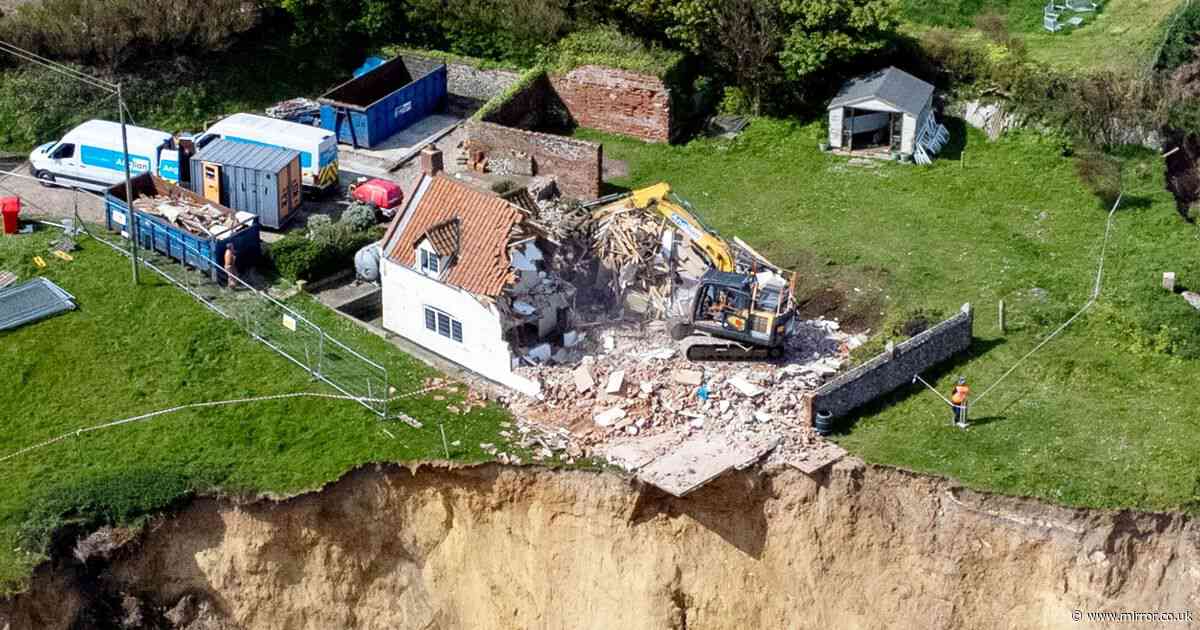 Heartbreak as 18th century farmhouse left hanging over perilous cliff edge is demolished