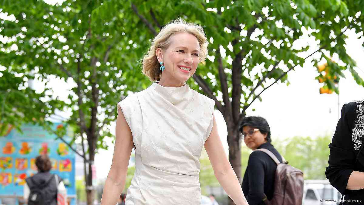 Naomi Watts, 55, cuts a youthful figure in a chic cream frock as she steps out in New York