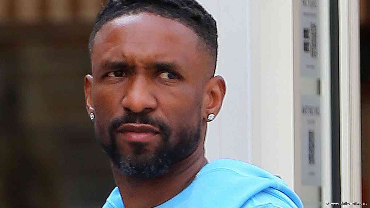 Jermain Defoe, 41, and midriff-flaunting girlfriend Alisha LeMay, 31, look stronger than ever on London day out - months after 'make-or-break' holiday in wake of cheating scandal