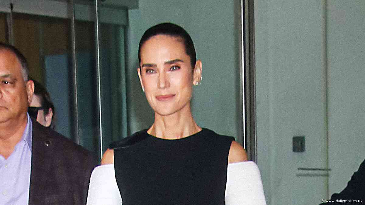 Jennifer Connelly cuts a chic figure in a cold-shoulder gown and heels as she steps out in NYC - after revealing her mom got her into acting as a child