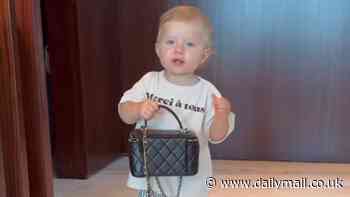 Molly-Mae Hague and daughter Bambi, 15 months, already share the same love for designer as the tot takes her first steps while reaching for a Chanel handbag