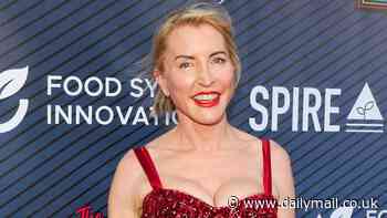 Heather Mills sparkles in a red jumpsuit as she attends  the 2024 Vegan Women Summit in Hollywood