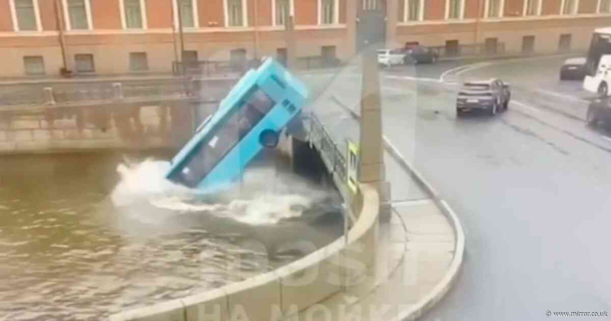 Bus full of passengers crashes off bridge into St Petersburg river with at least seven killed