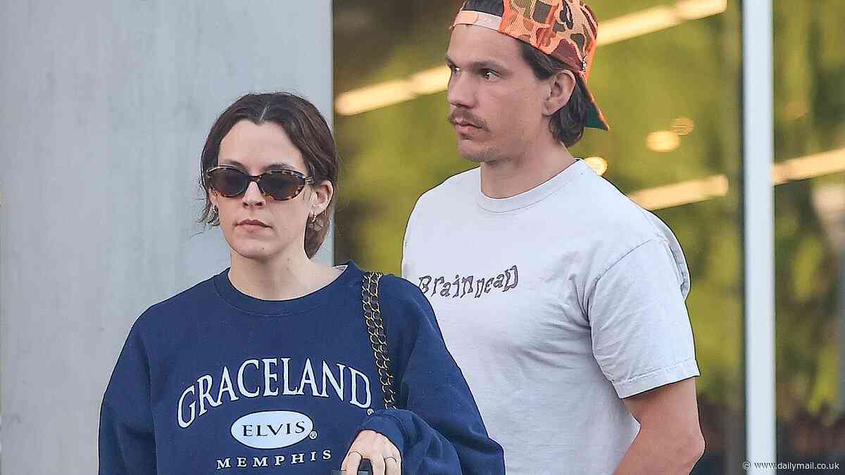 Riley Keough wears a sweatshirt from her grandfather Elvis Presley's estate Graceland while with her husband Ben Smith-Petersen in Los Angeles