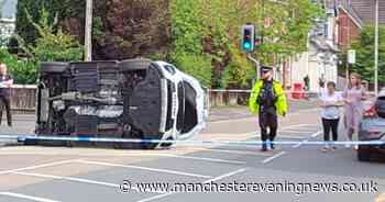 Driver escapes serious injury after van flips over during a crash