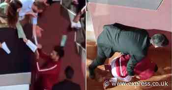 Novak Djokovic falls to floor in pain after being hit by bottle at Italian Open