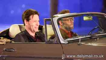 Seth Rogen cruises down iconic Hollywood Blvd in classic convertible alongside Ike Barinholtz while filming Apple TV+ comedy series The Studio