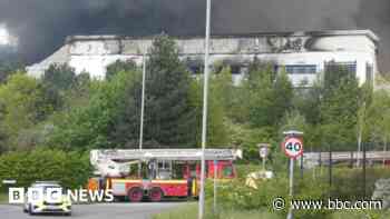 Cannock warehouse blaze not out yet - fire service
