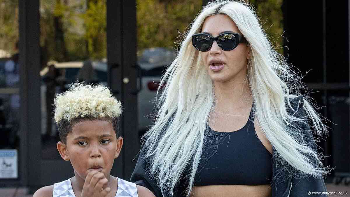 Kim Kardashian matches blonde hair with son Saint, eight, as they arrive at his basketball game... with ex Kanye West sneaking in separately