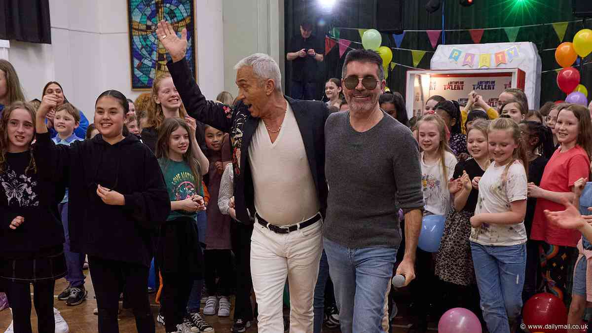 Simon Cowell shows off his softer side on Britain's Got Talent as he and fellow judge Bruno Tonioli jump out of a box to surprise kids group Amasing