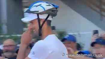 Novak Djokovic arrives at the Italian Open wearing a HELMET... as the world No 1 sees the funny side despite being left bloodied after he was struck in the head by a bottle in Rome