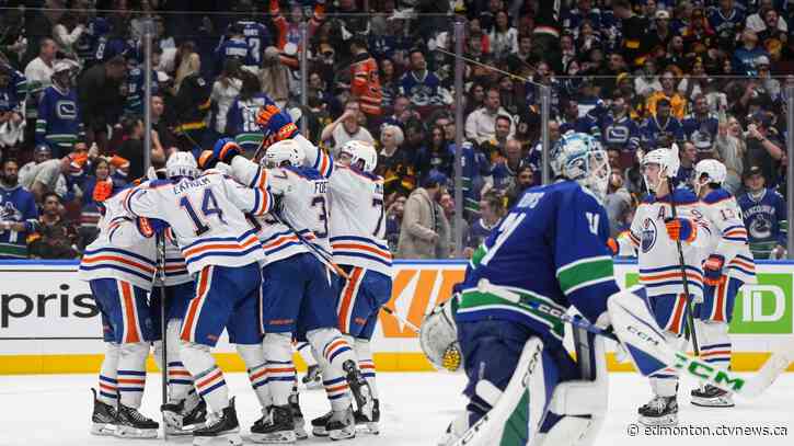 Oilers defeat Canucks 4-3 in OT to even series