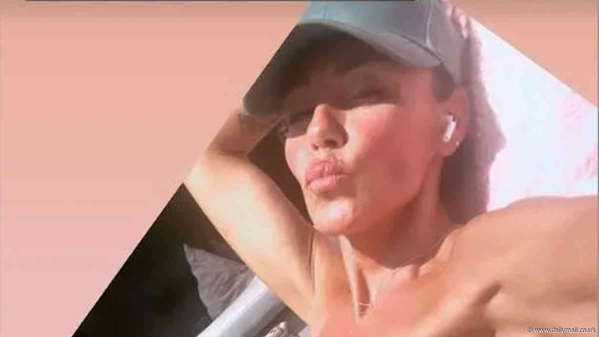 Michelle Heaton showcases her dramatic body transformation in tiny pink bikini as she lounges in the sun
