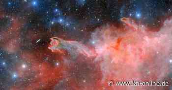 "Hand Gottes" greift nach Galaxie: Weltraumteleskope zeigen erstaunliche Wolkenhand