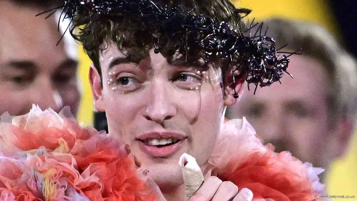 Eurovision winner Nemo BREAKS their thumb moments after smashing trophy during chaotic celebrations - after Swiss star made history as first non-binary show champion