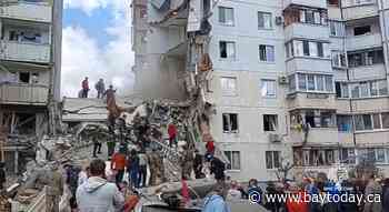 An apartment block collapses in a Russian border city after heavy shelling, with deaths reported
