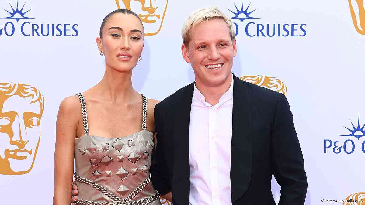 BAFTA Television Awards 2024: Sophie Habboo cuts an edgy figure in a bold silver metallic gown as she poses with husband Jamie Laing
