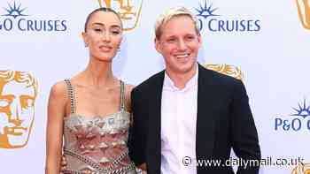 BAFTA Television Awards 2024: Sophie Habboo cuts an edgy figure in a bold silver metallic gown as she poses with husband Jamie Laing