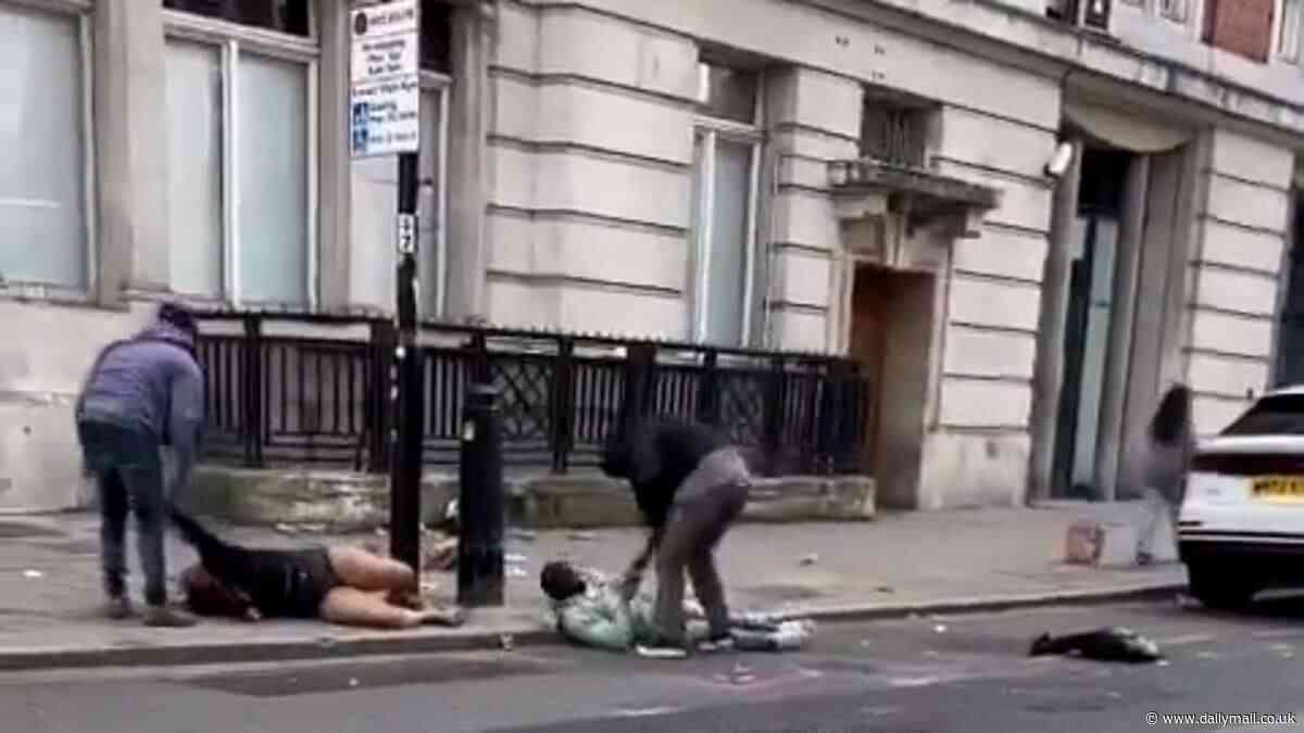 Horrific moment two people including a woman are violently mugged by thugs near London Euston station - leaving victims sprawled on the floor as capital is rocked by lawless crime