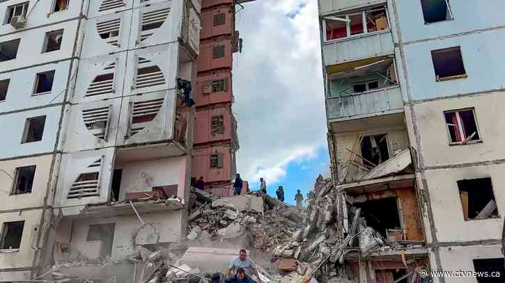 An apartment block collapses in a Russian border city after heavy shelling, killing at least 2