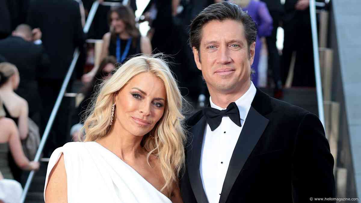 Strictly's Tess Daly wows in fitted one-shoulder bridal dress alongside Vernon Kay