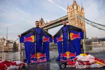 Skydivers complete wingsuit flight through Tower Bridge in world first