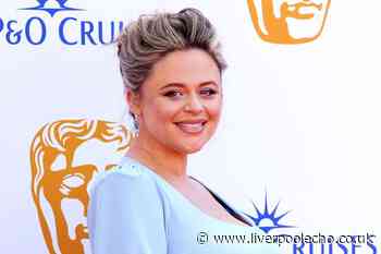 Emily Atack flaunts baby bump in pale blue gown on BAFTA red carpet